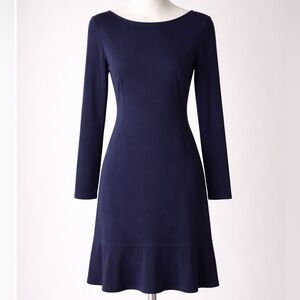 Navy dress with large pleating detail at hem. NOWT